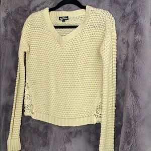 Knit sweater with lace on sides